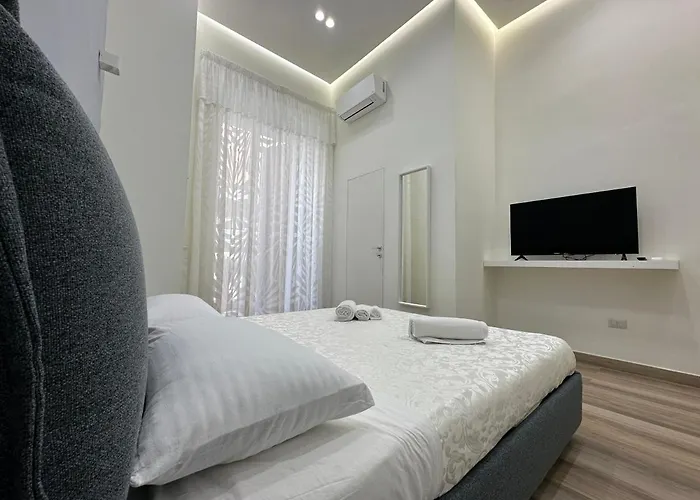 Sun Art Naples Rooms